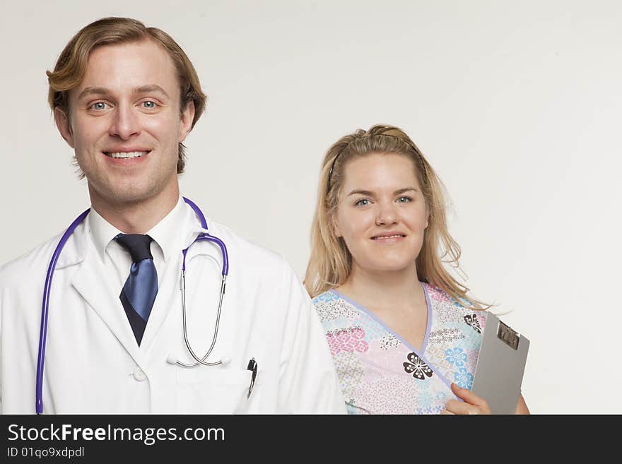 Portrait of two medical professionals smiling. Portrait of two medical professionals smiling