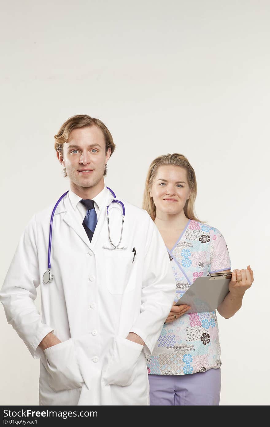 Portrait of two medical professionals smiling. Portrait of two medical professionals smiling