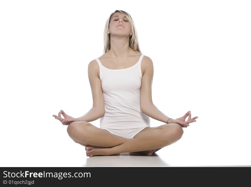 Young woman making yoga- exercises