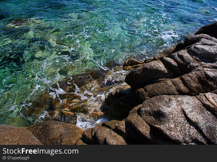 Seashore with rocks and beautiful clera water