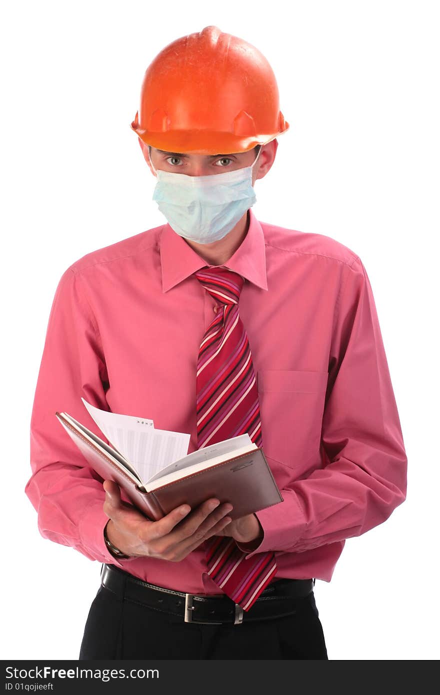 The engineer in a helmet and a mask the isolated background