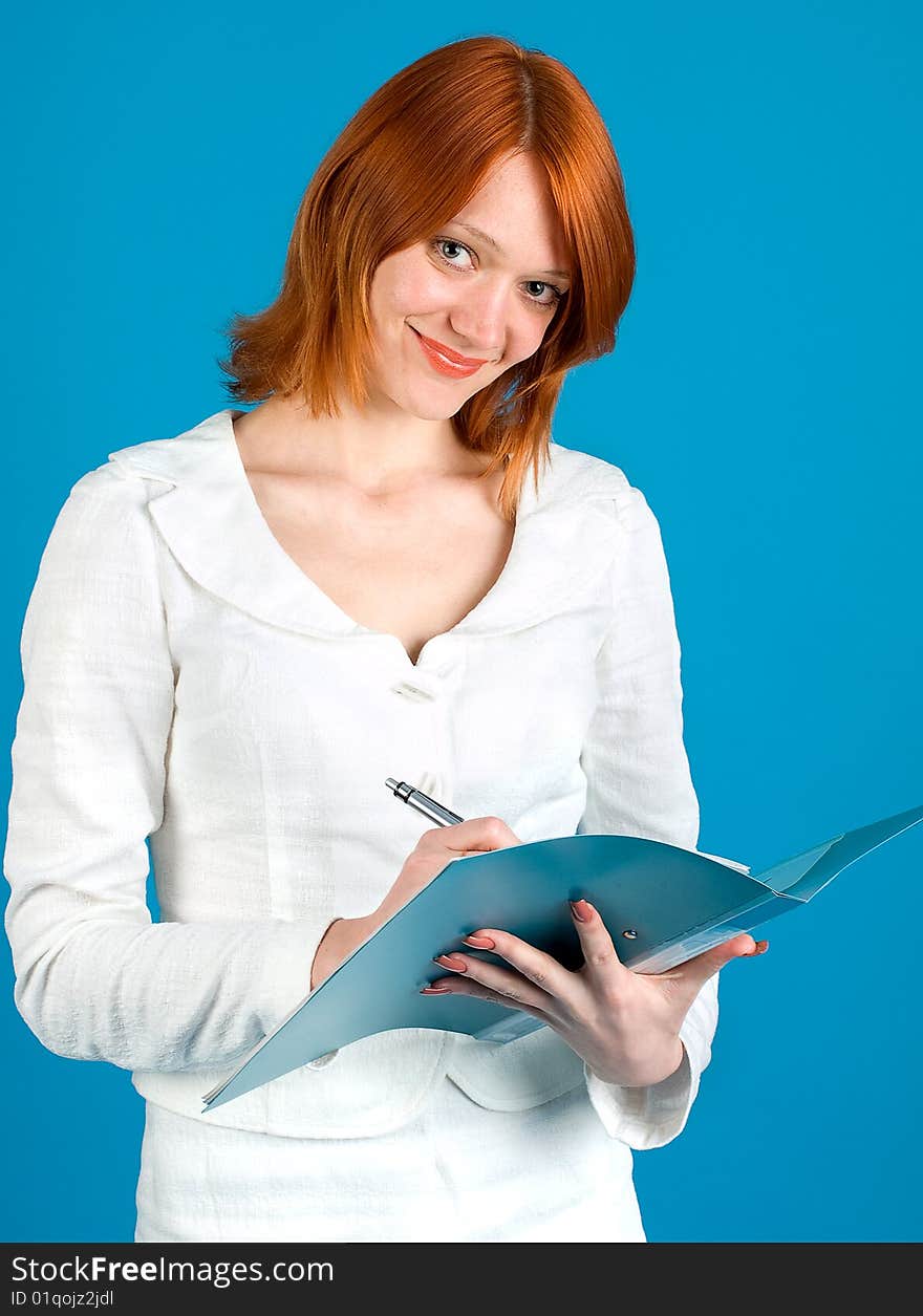 Pretty secretary held folder, isolated on blue background