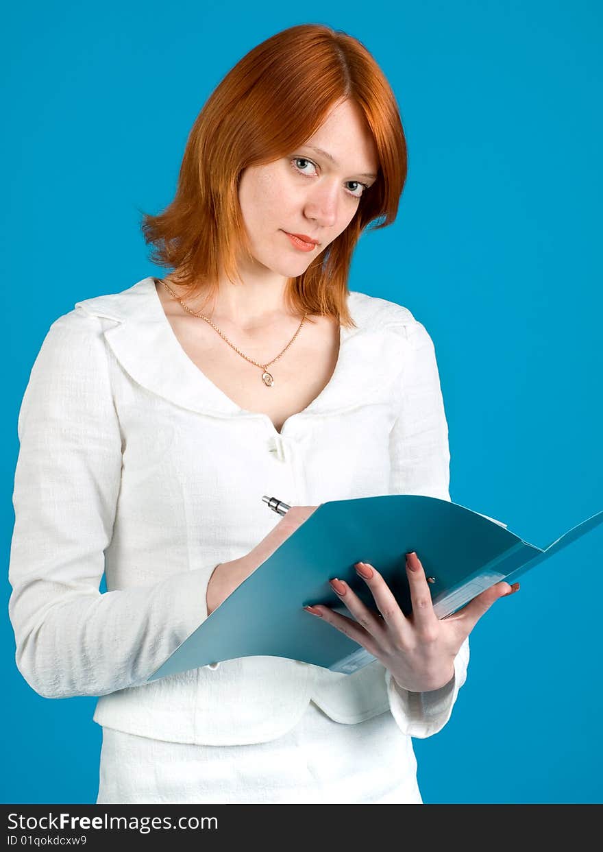 Pretty secretary held folder, isolated on blue background