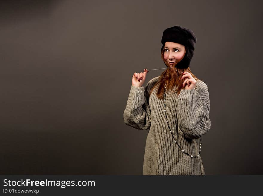 Smiling Red Haired Girl In Winter Hat