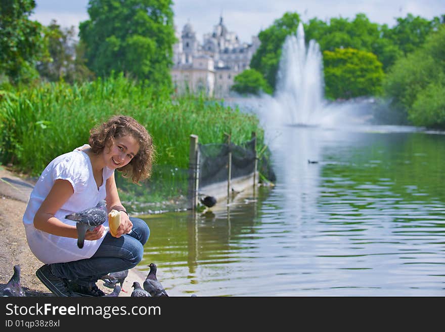 Girl Feeds Birds