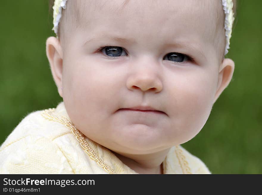 Little baby girl with headband outdoors. Little baby girl with headband outdoors