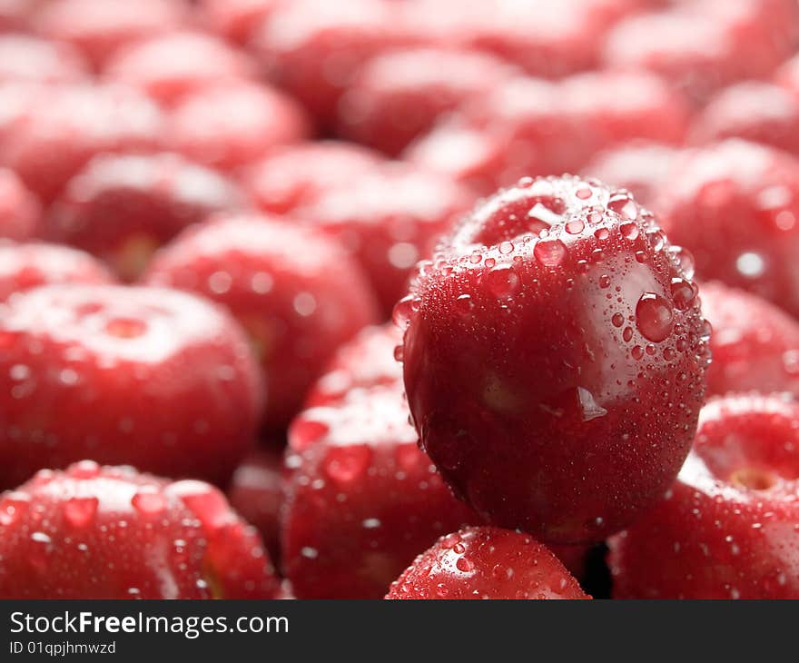 Wet ripe red cherry background. Wet ripe red cherry background.