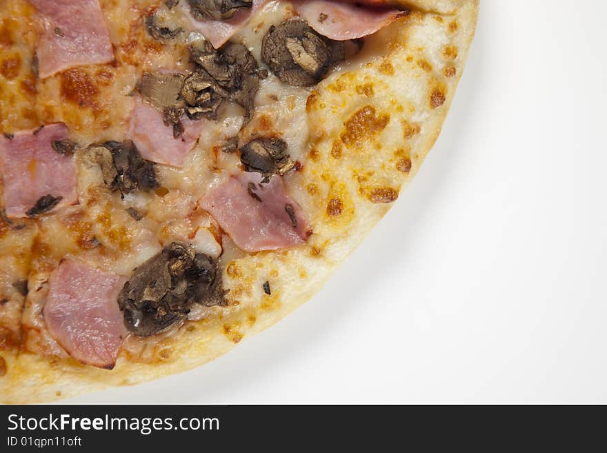 A couple of delicious pizzas, with raw tomatoes, green peppers and mushrooms. A couple of delicious pizzas, with raw tomatoes, green peppers and mushrooms