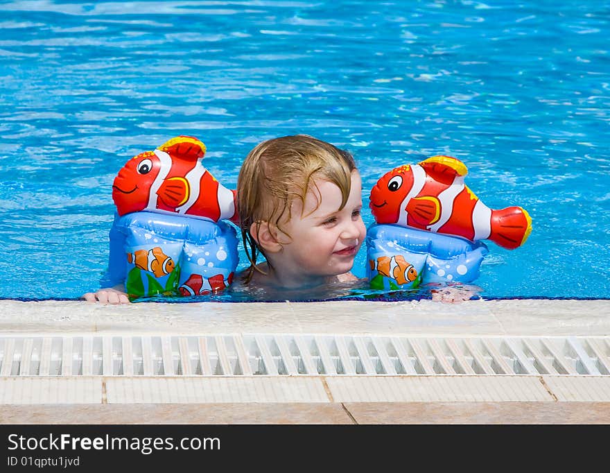 Little girl in the swimming pool. Little girl in the swimming pool