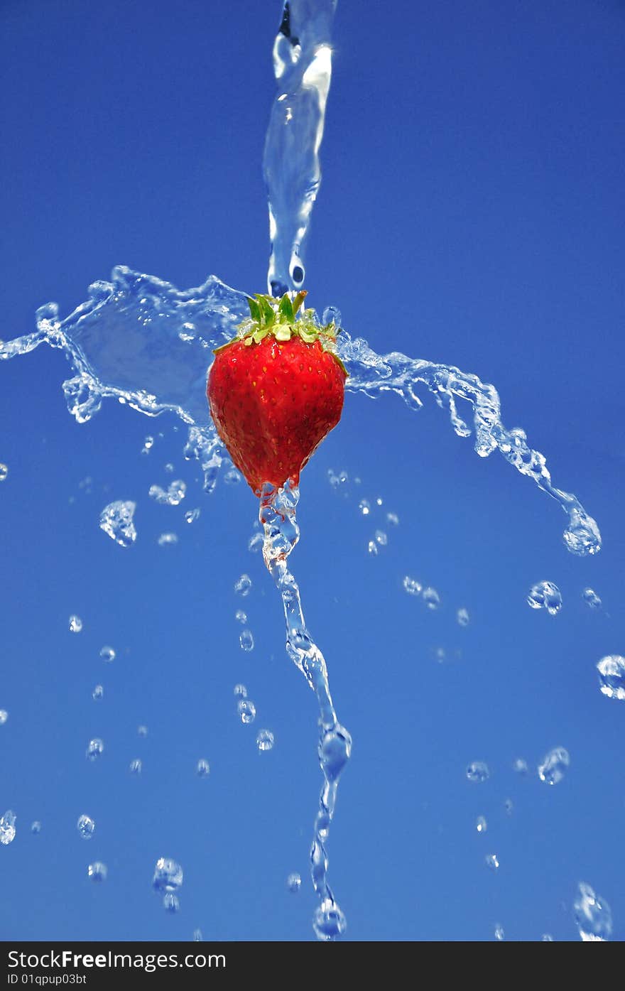 Strawberry in water against the sky