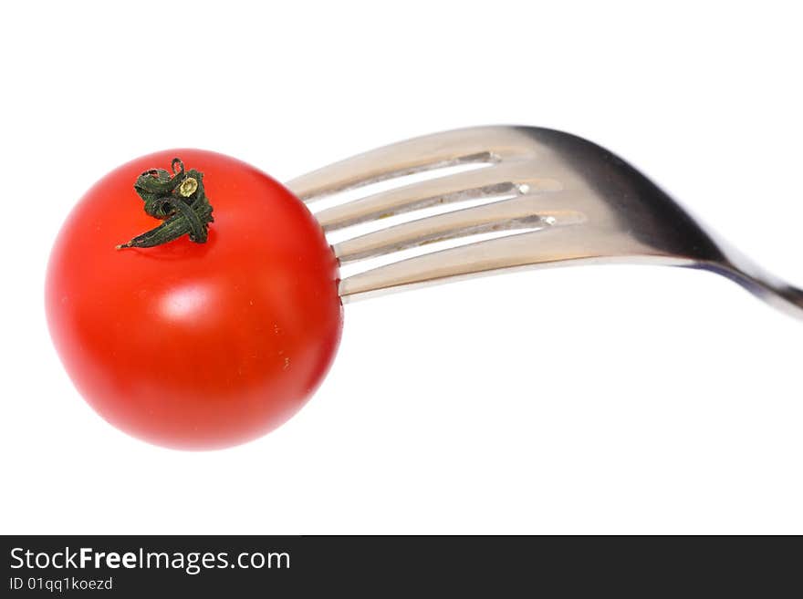 Detail of tomato with fork