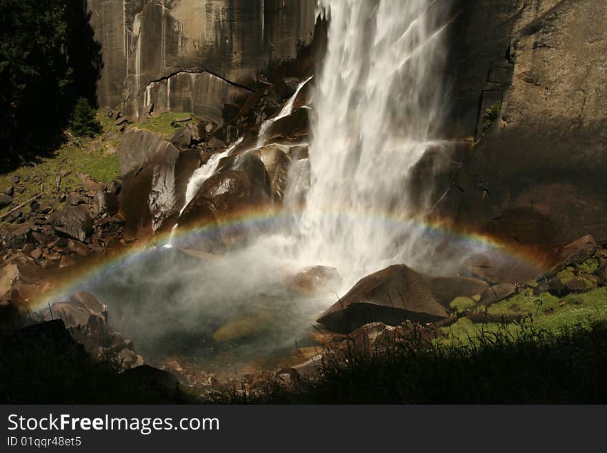 Shot of a rainbow at the base of Vernal Fall, Yosemite National Park, California. Shot of a rainbow at the base of Vernal Fall, Yosemite National Park, California