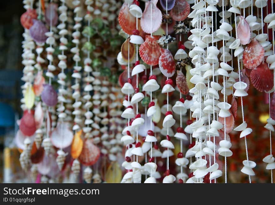 Shelled curtain is a famous souvenir of tropical beach steet market, Thailand