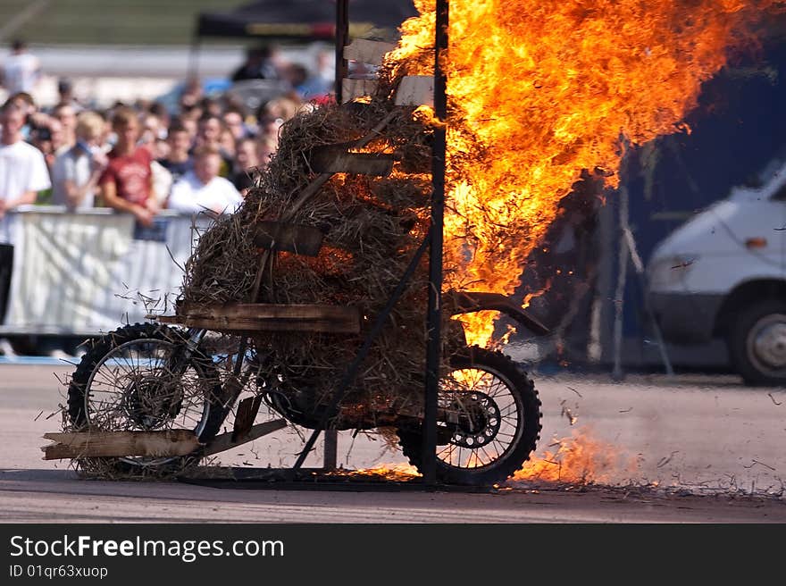 Stunt rider and wall of flames