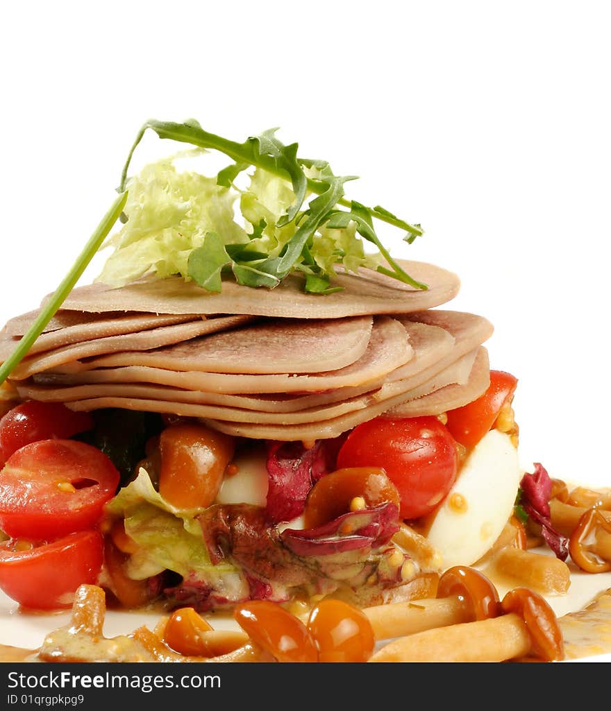 Smoked tongue served with mushrooms and tomatos isolated on white