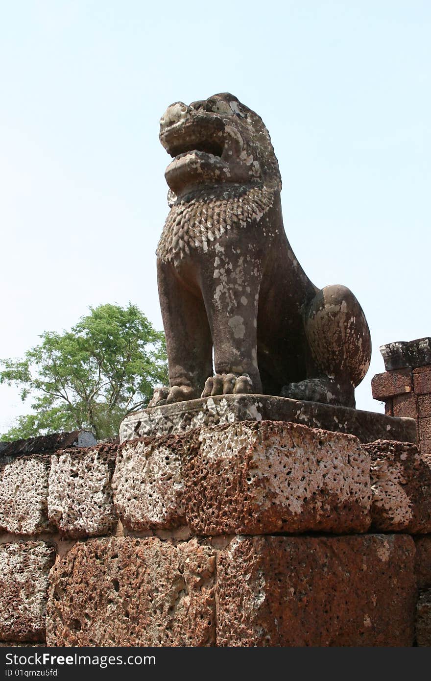 A lion sculpture in an Angkor temple. A lion sculpture in an Angkor temple