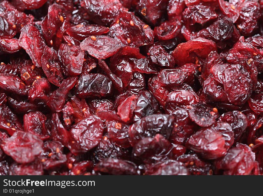 A macro shot of a heap of cranberries. A macro shot of a heap of cranberries.