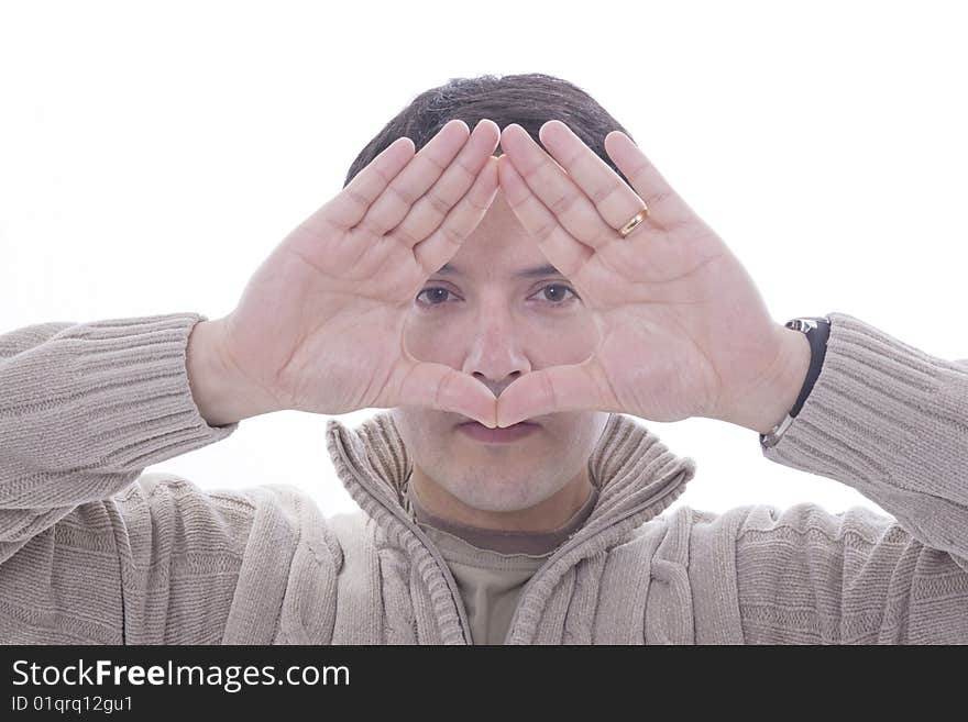 A young man playing with his hands. A young man playing with his hands