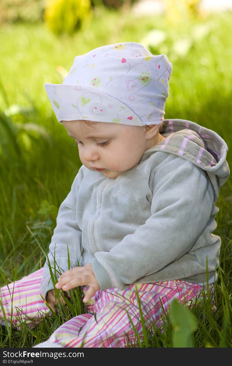 Sweet baby girl on grass. Sweet baby girl on grass