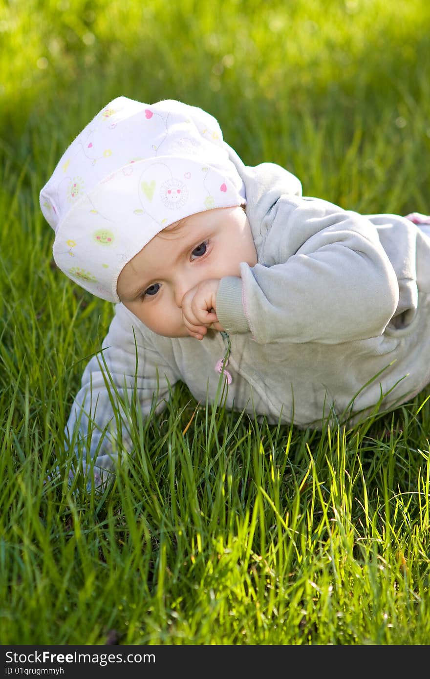 Sweet baby girl on grass. Sweet baby girl on grass