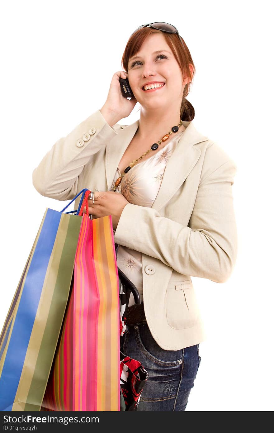 Young brunette woman with shopping bags. Young brunette woman with shopping bags