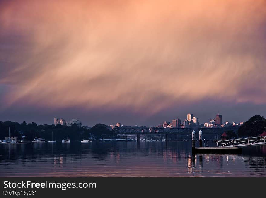 Dramatic rain clouds over water