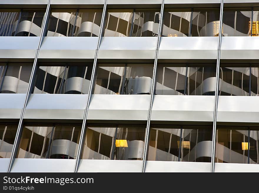 Image of a corporate building with blue tinted windows