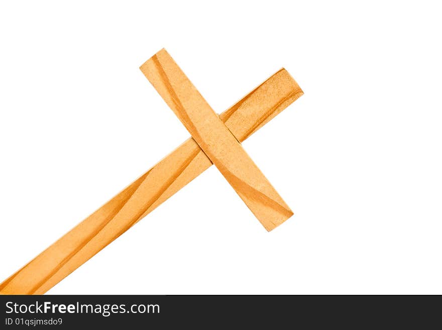 A wooden cross with white background.