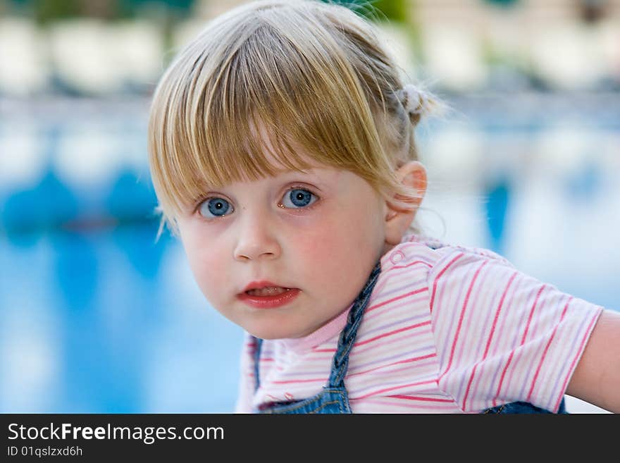 Little girl in the swimming pool