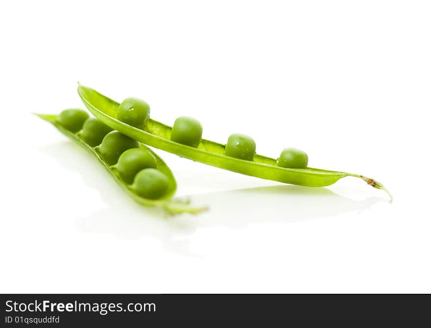 Peas in the pod isolated on white