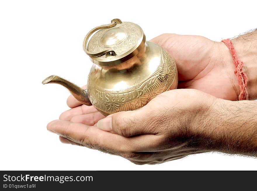 Holy vessel in hands isolated in white background.