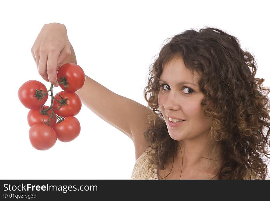 Pretty smiling girl holding branch of red tomatoes. Isolated over white background. Beautiful young woman with fresh vegetables. Pretty smiling girl holding branch of red tomatoes. Isolated over white background. Beautiful young woman with fresh vegetables.