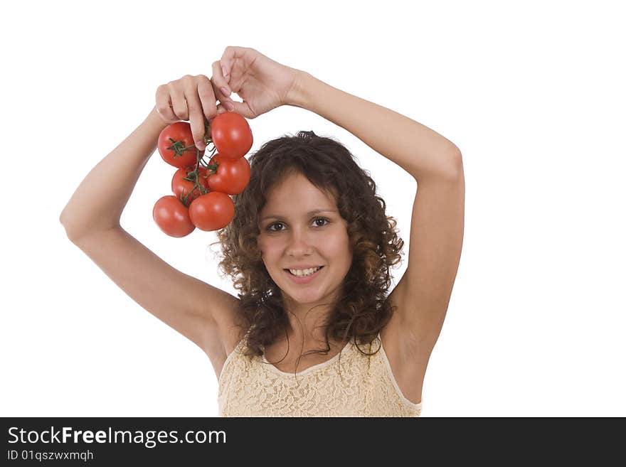 Pretty smiling woman holding branch of red tomatoes. Isolated over white background. Beautiful girl with fresh vegetables. Pretty smiling woman holding branch of red tomatoes. Isolated over white background. Beautiful girl with fresh vegetables