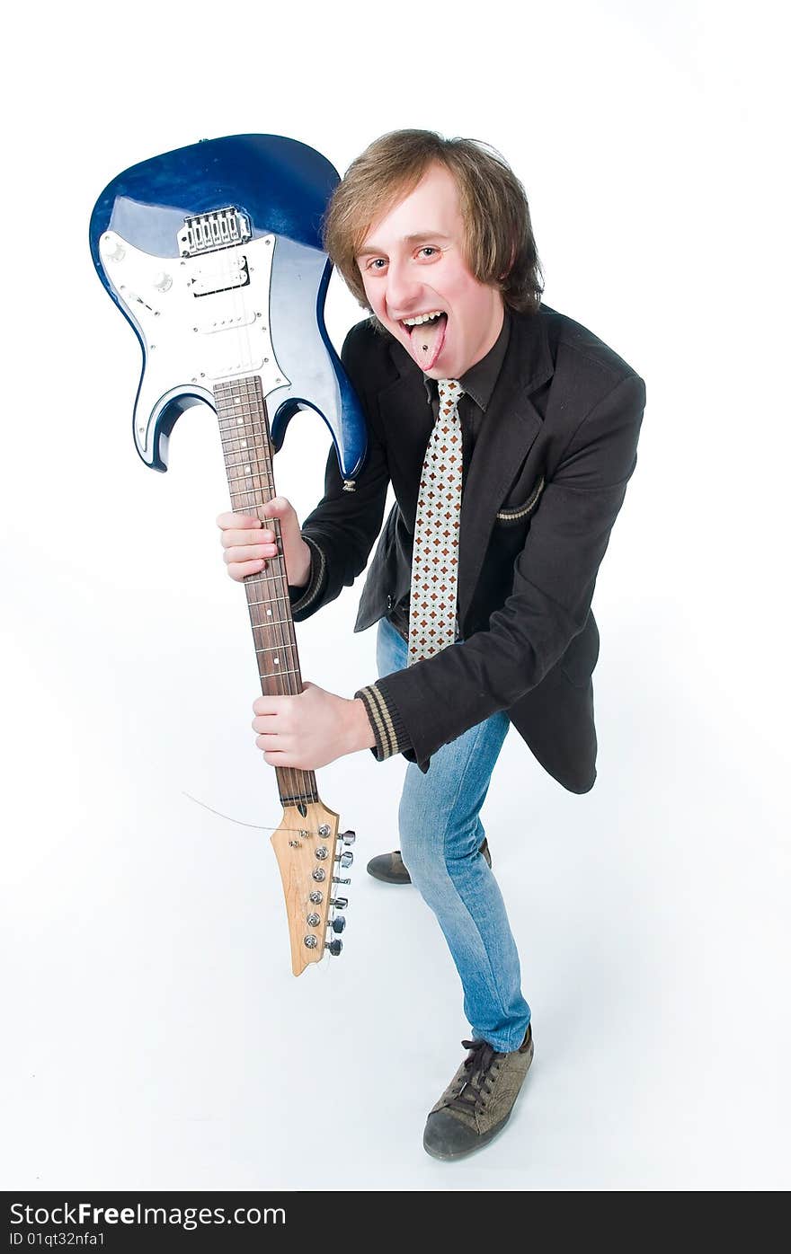 Screaming man with electro guitar, high angle view