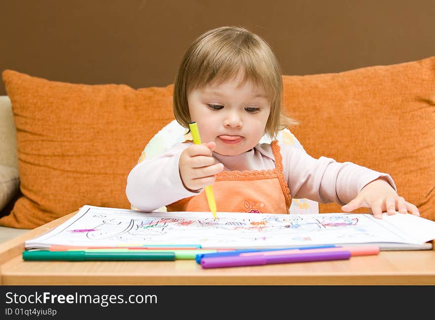 Sweet toddler baby girl drawing