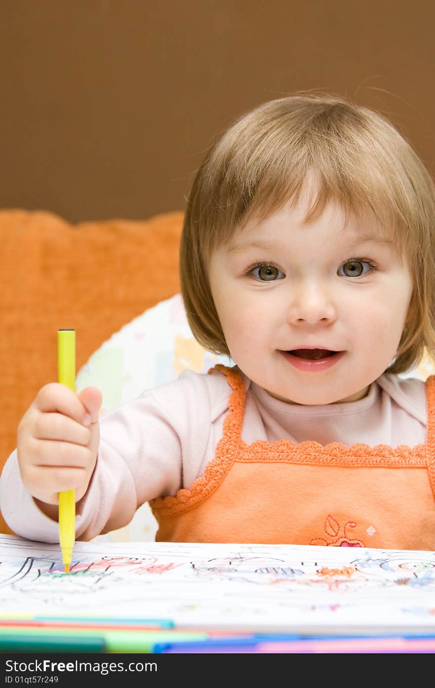 Sweet toddler baby girl drawing