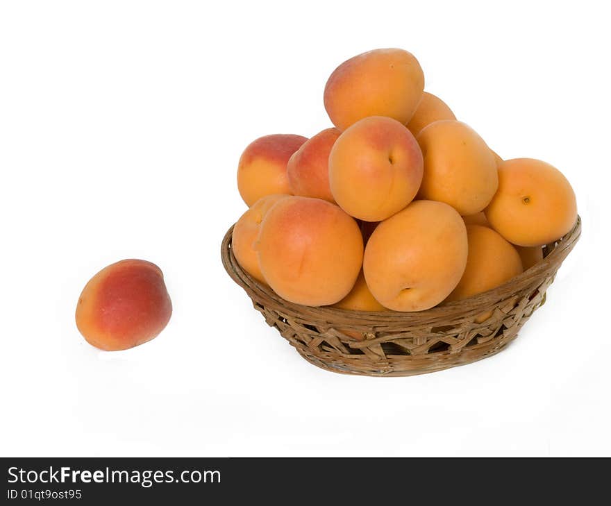 Basket with pile of apricots