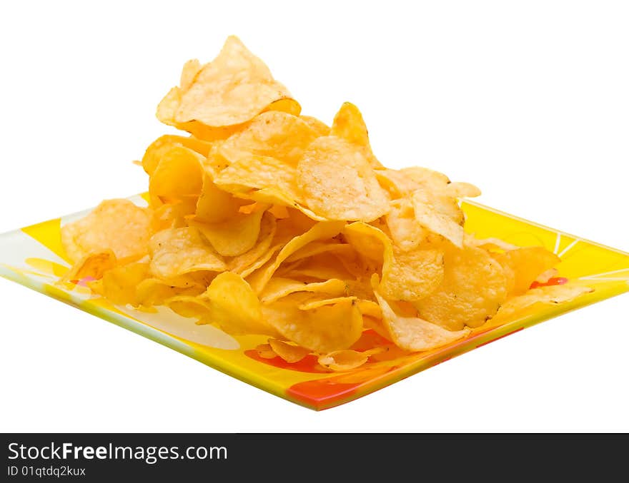 Close-up potato chips on plate isolated on white background