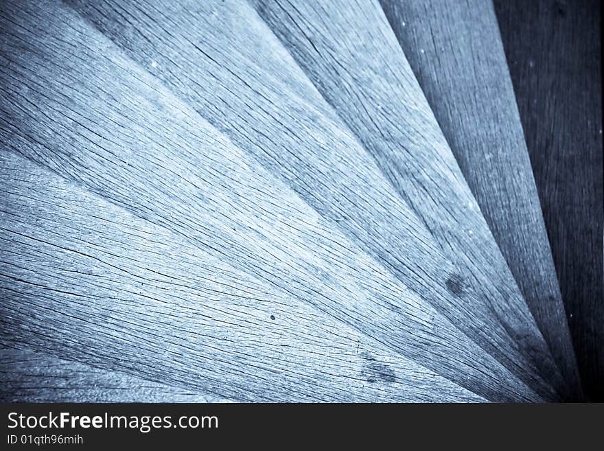 Section of a wooden staircase spiralling downwards. Section of a wooden staircase spiralling downwards