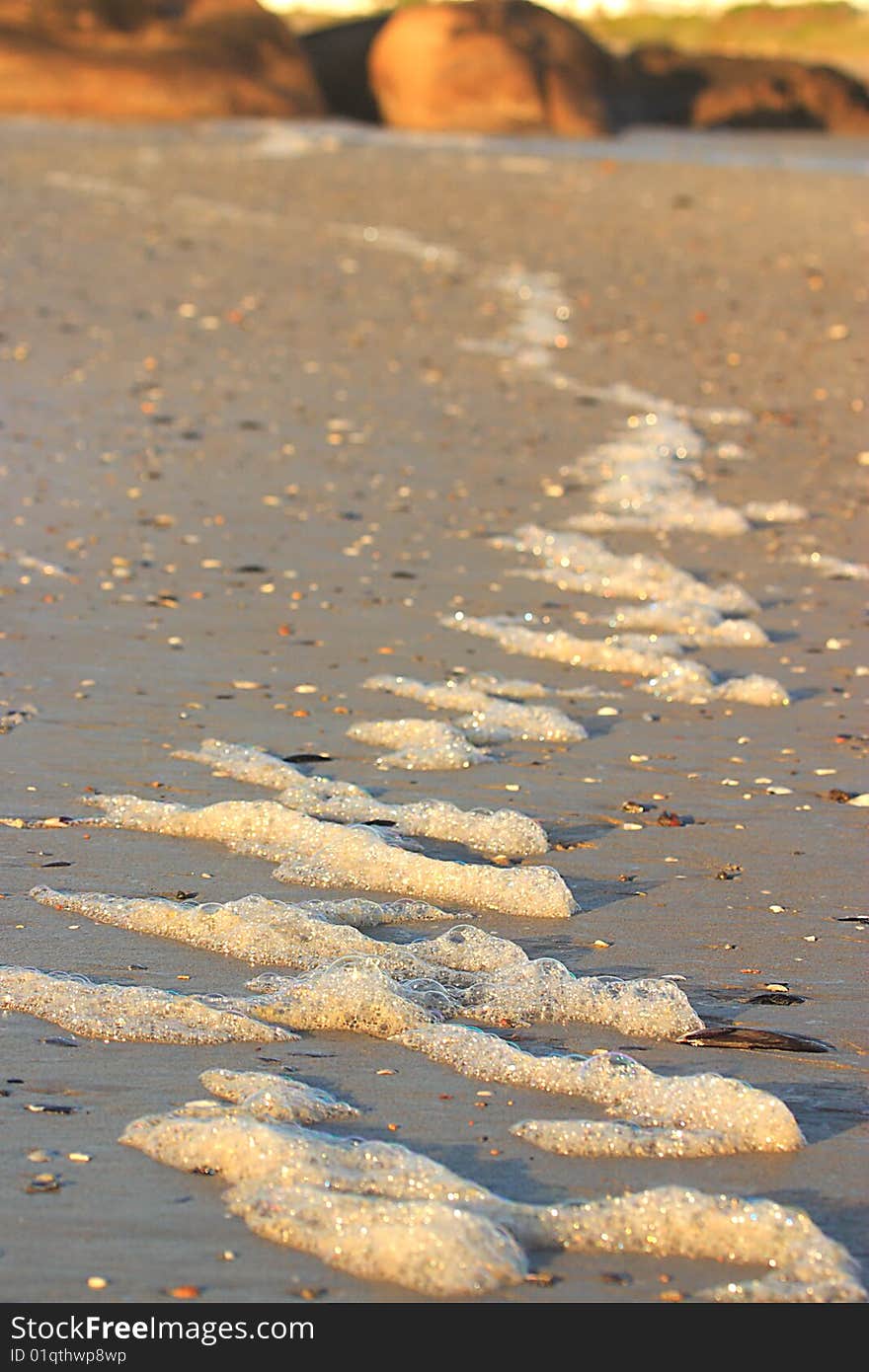 Foam on beach in Paternoster, South Africa