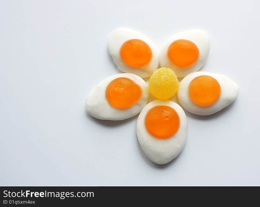 A selection of retro sweets in the shape of a flower. A selection of retro sweets in the shape of a flower