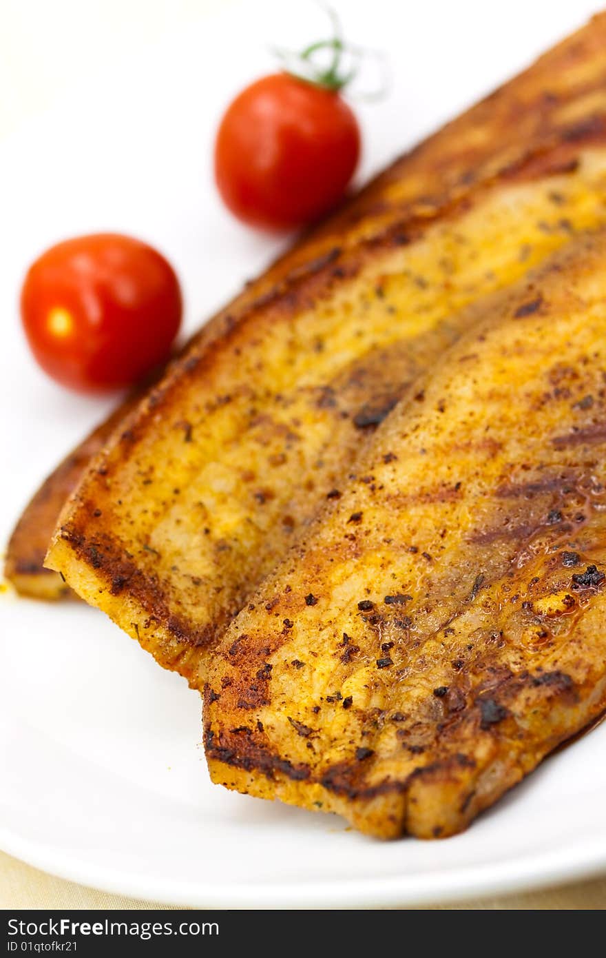 Roasted Belly of Pork with cherry tomatoes