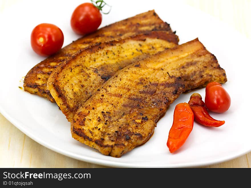 Roasted Belly Of Pork With Cherry Tomatoes