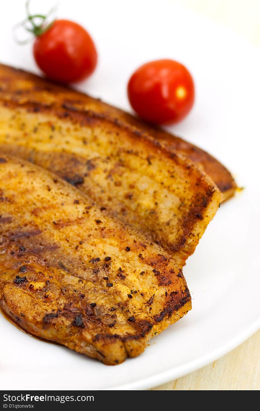 Roasted Belly of Pork with cherry tomatoes