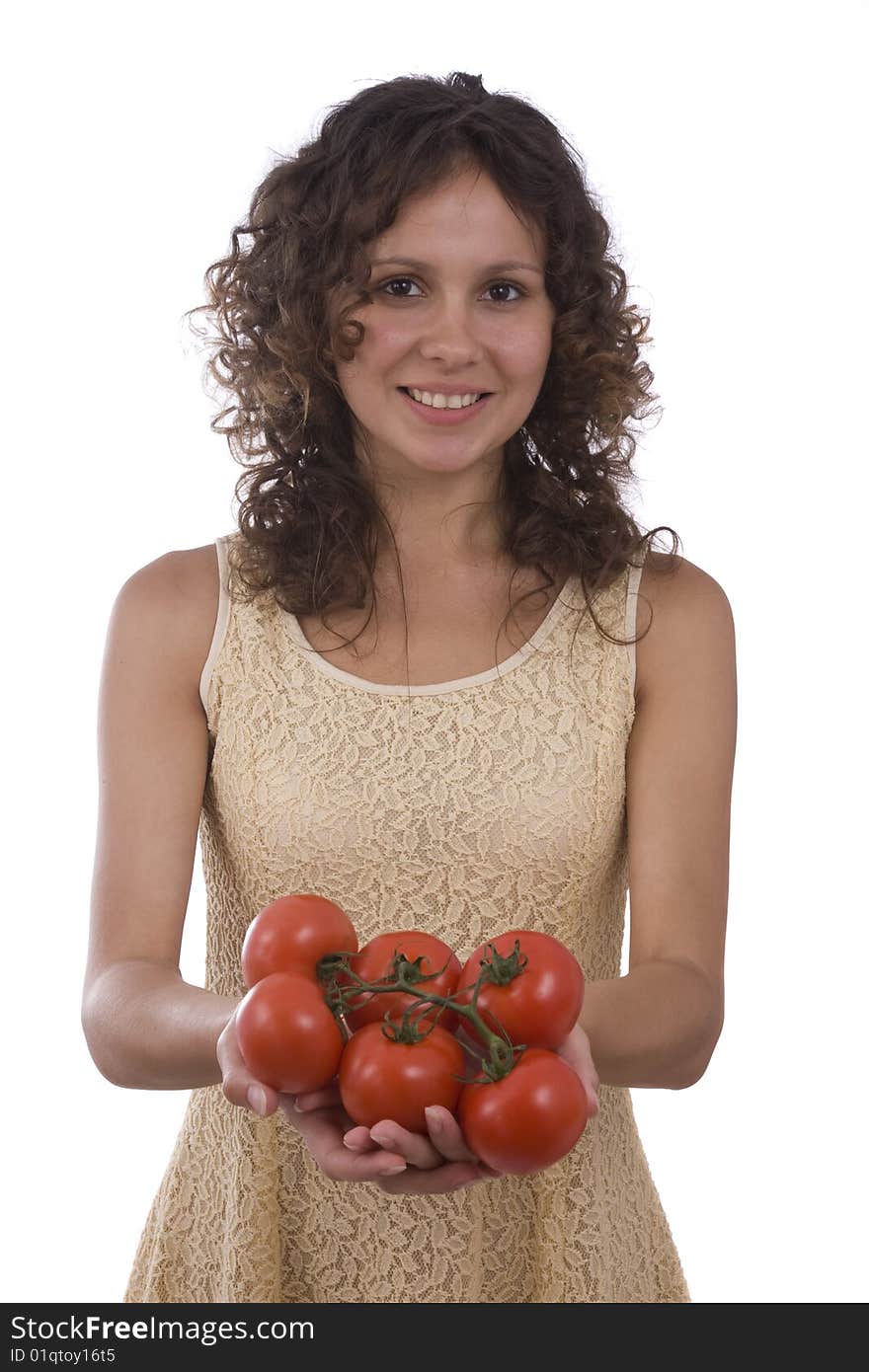 Pretty smiling woman holding branch of red tomatoes. Isolated over white background. Beautiful girl with fresh vegetables. Pretty smiling woman holding branch of red tomatoes. Isolated over white background. Beautiful girl with fresh vegetables