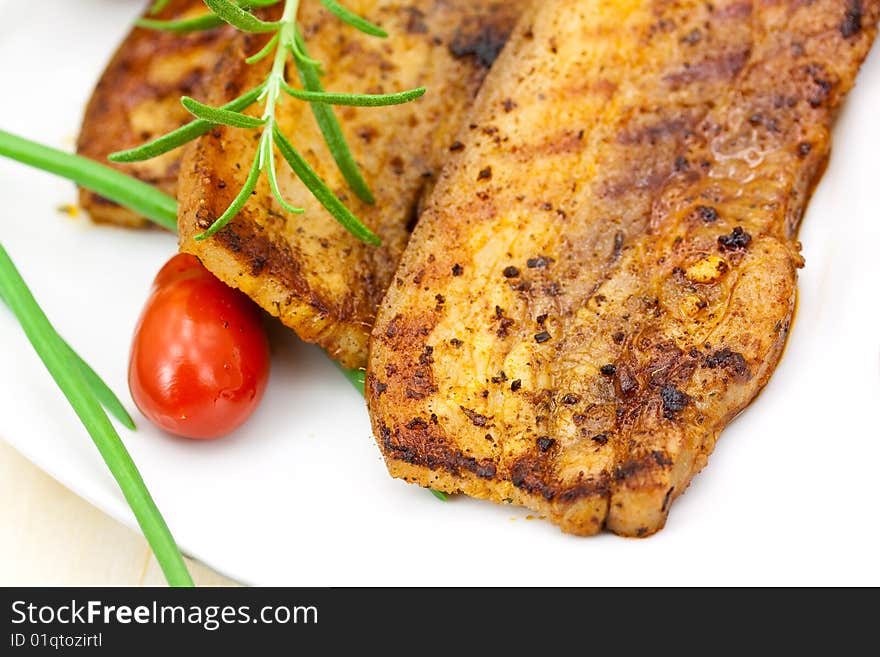 Roasted Belly of Pork with cherry tomatoes