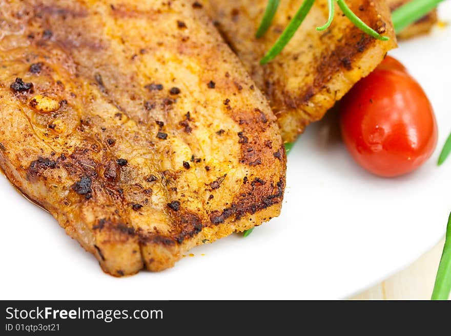 Roasted Belly of Pork with cherry tomatoes