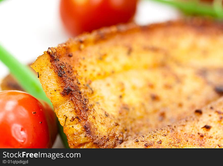 Roasted Belly of Pork with cherry tomatoes