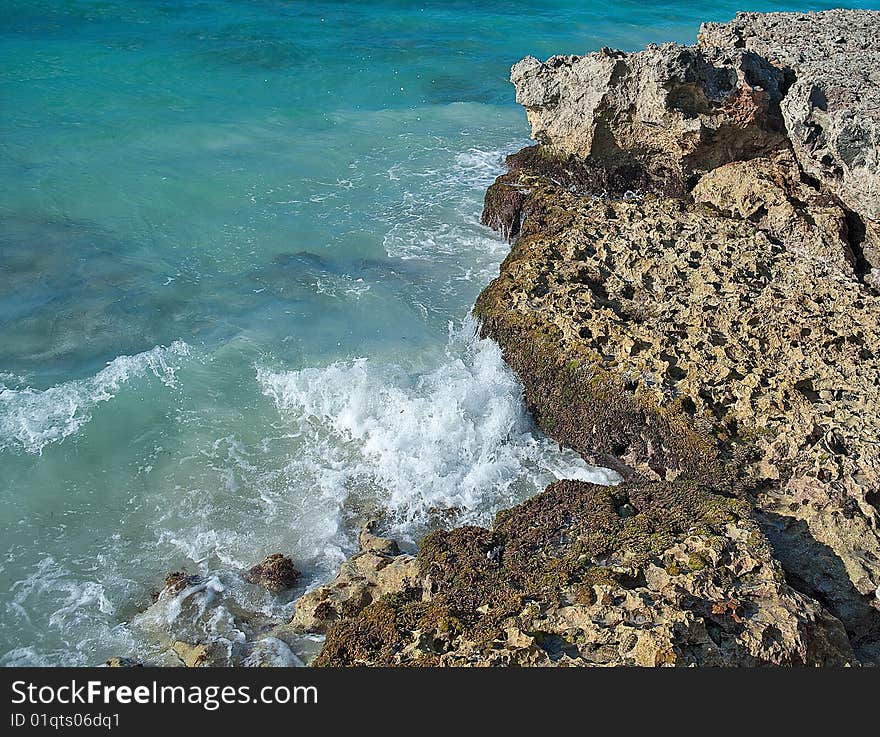 Rocky coastline with waves coming in and out. Rocky coastline with waves coming in and out