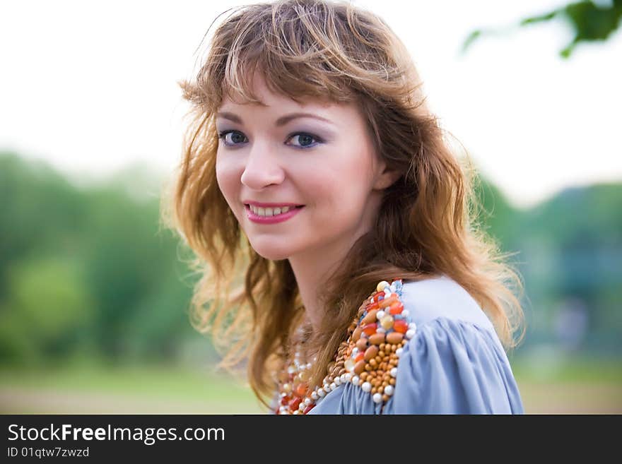 Portrait of a beautiful young lady smiling. Portrait of a beautiful young lady smiling